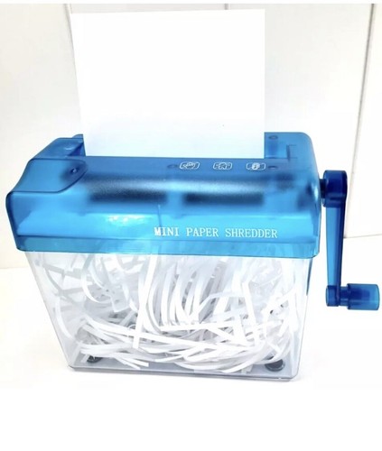 Mini document shredder - document, hand